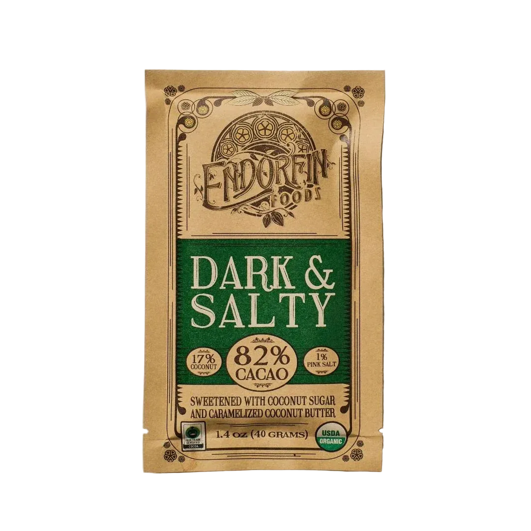 Sea Salt Dark Chocolate Bar, 82% Cacao, Vegan, front of package on cream surface