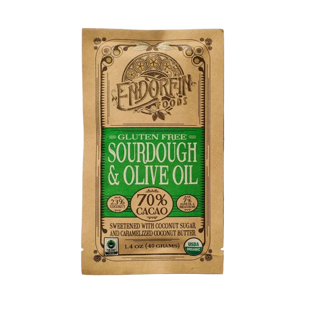 Sourdough & Olive Oil Chocolate Bar | 70% Cacao, front of package on cream surface