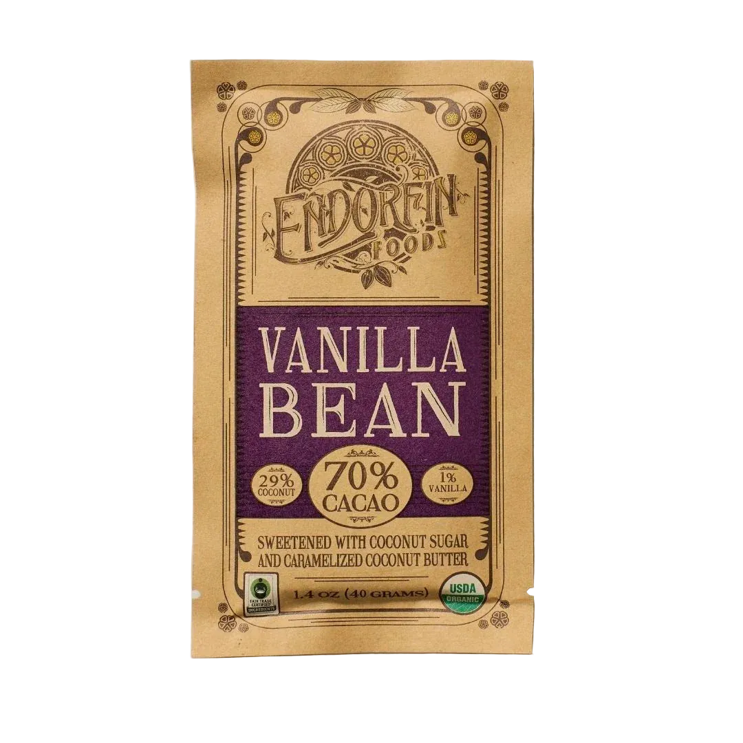 Vanilla Dark Chocolate Bar, 70% Peruvian Cacao, Madagascar Vanilla, front of package on cream surface